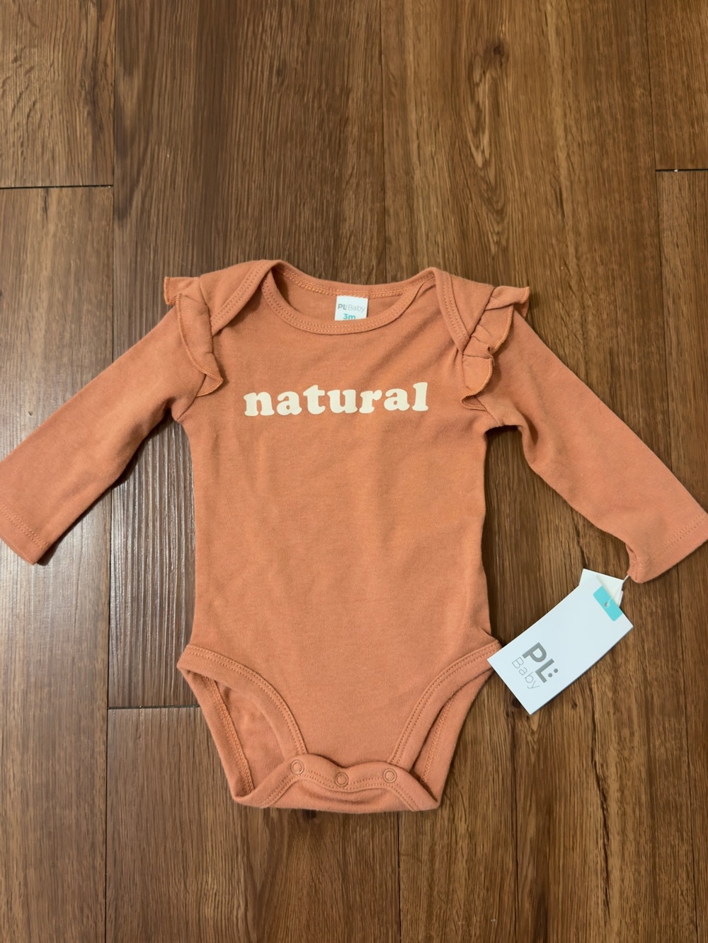Long-Sleeve Rust One-Piece Bodysuit with 'natural' Print